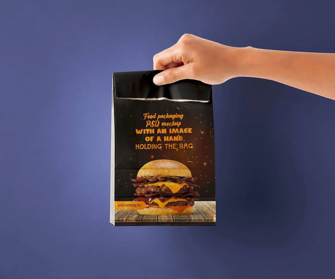 Free Food packaging PSD mockup with an image of a hand holding the bag