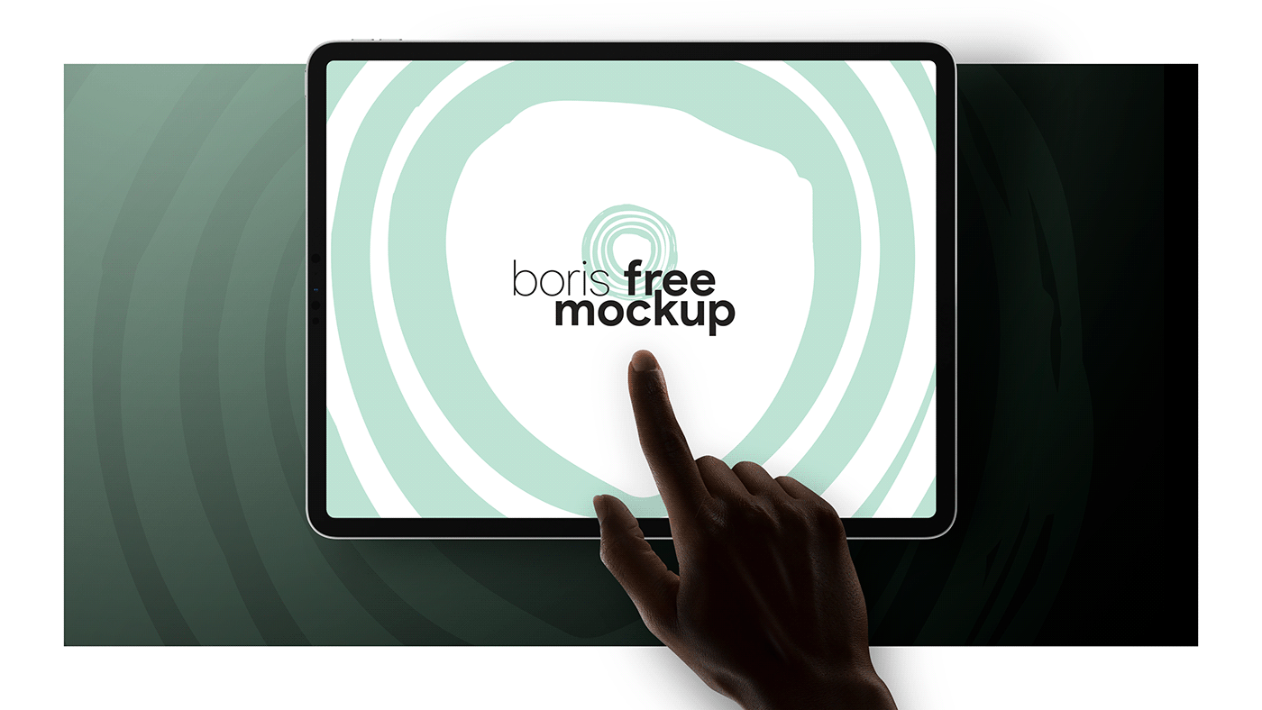 Free PSD finger pointing to iPad Pro screen mockup